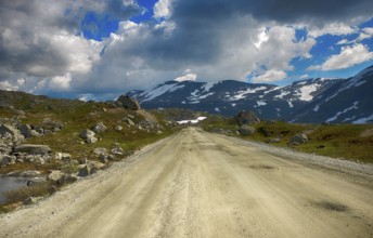 Gamle strynefjellsvegen road one of the most beautifull auto roads in norway with snow in summer