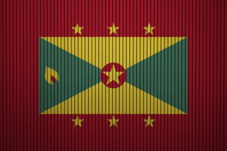 Grenada Flag painted on the cracked grunge concrete wall