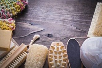 Scrub peeling brush body scrubber massager loofah bar of soap on wooden board