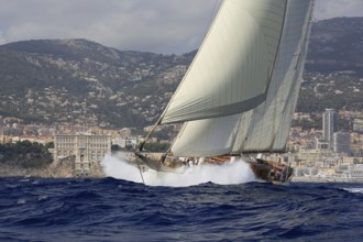 90-year-old sailing yacht Three-masted topsail schooner XARIFA sails during Monaco Classic Week.