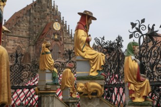 Beautiful fountain on the main market square, tubular fountain with 40 figures from the 14th