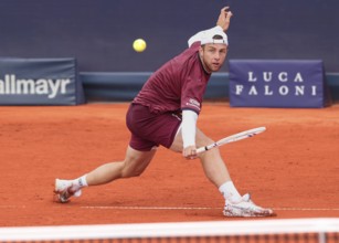 Dutch tennis player Tallon Griekspoor playing a backhand volley at the 2025 BMW Open tournament in