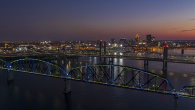 Multi Colors of light hit the Big Four bridge before sunrise around Lousville Kentucky