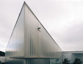 Angra do Heroismo, Portugal, July 1, 2022: New building of modern architecture with U-glass facade