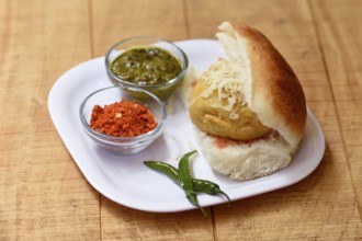 Vada Pav or Wada Pav, Indian Desi Burger is a street food dish from Mumbai, Maharashtra. Indian
