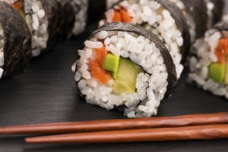 Salmon rolls served on a plate