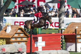 Martin Fuchs of Switzerland, riding Commissar Pezi competes in the BMO Nations Cup during the CSIO