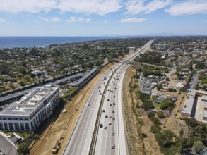 Aerial view of highway transportation with small traffic, highway interchange and junction, San