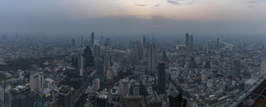 A panorama picture of the buildings of South Bangkok at sunset