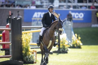 Sameh El Dahabn of Great Britain and riding WKD Toronto compete in the first round of the 1.60m