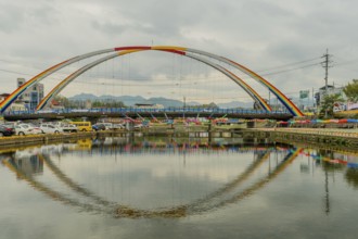 Youngdong County, South Korea. April 25, 2019: Paper lanterns hanging from double arch bridge over