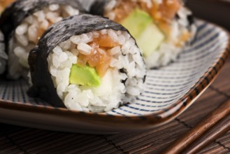 Sushi - Salmon rolls served on a plate