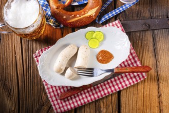Bavarian veal sausage pretzels and beer at the Oktoberfest