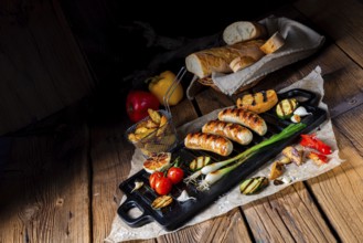 Delicious grilled sausage with various grilled vegetables