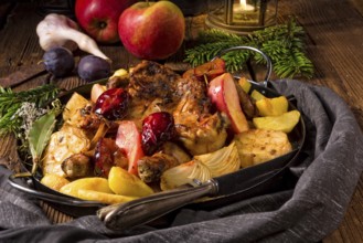 Chicken pieces with fruit and vegetables