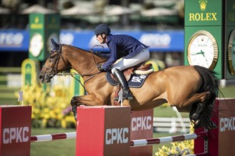 German rider Daniel Deusser riding Killer Queen VDM competes in the second round and jumpoff of the