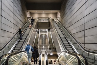 Copenhagen, Denmark, August 12, 2016: People using escalators in the subway of Copenhagen. Blur