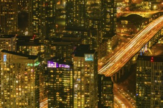 Highway and buildings at night. Shooting Location: Toronto