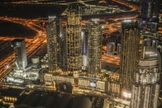 Dubai night view seen from the observation deck of Burj Khalifa. Shooting Location: Dubai