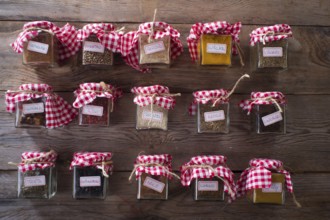 Of small glass jars for storage of various types of aromas for international cuisine