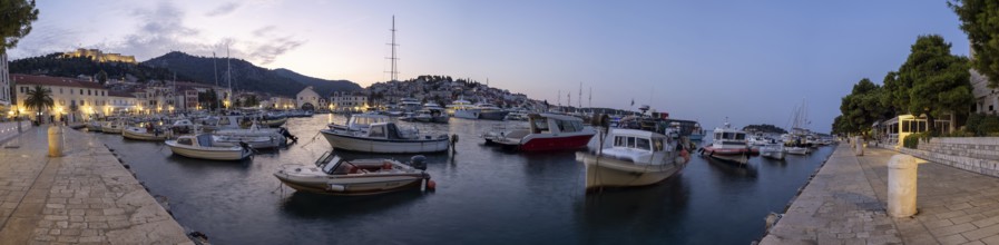 Morning atmosphere, boats in the harbour, panoramic shot, town of Hvar, island of Hvar, Dalmatia,