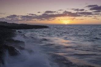 Peaceful sunrise seascape at Cap de ses Salines on Mallorca's southernmost point