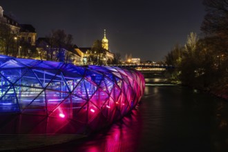 Illuminated Mur Island, behind the tower of the Franciscan Church, night shot, Graz, Styria,