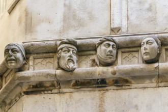 Human heads on the side portal of The Cathedral of St. James, Sibenik, Croatia, Europe