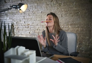 Funny businesswoman chat pencil mustache expression on laptop comuter