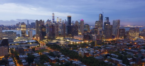 It's hard to tell where Jersey City and and Manhattan begins before sunrise