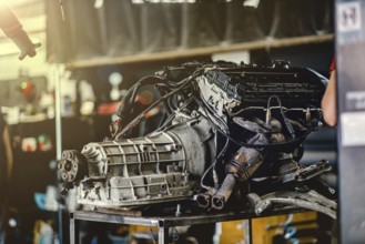 Repairing a car engine in a car service center