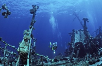 Diver explores unknown shipwreck, Egypt, Zabargad, Zabarghad, Red Sea, Africa