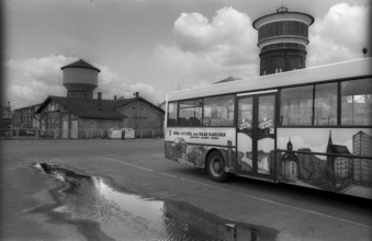 Germany, Angermünde, 20/04/1992, bus station, bus, puddle, Europe