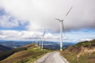 Renewable energy. Wind turbines, eolic park in scenic landscape of basque country, Spain, Europe