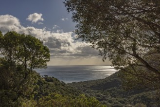 View of the glittering sea and Monte Ferru, Ogliastra, Sardinia, Italy, Europe