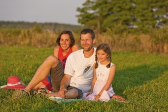 Family on a summer meadow, Altdöbern, Brandenburg, Germany, Europe