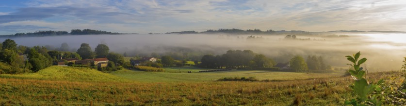 Arzua, Spain, September 10th 2023: View on a farm and surrounding fields during sunrise on the