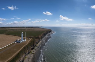 Aerial landscape view of the Nash Point Lighthouse and Monknash Coast in South Wales, United