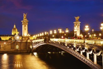Pont Alexandre III in Paris France sunset over Seine river