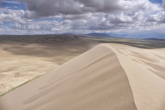 Barkhans in Mongolia. Sandy dune desert Mongol Els near lake Durgen Nuur. Khovd province, Western