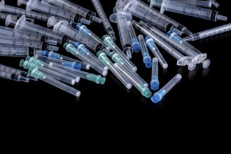 Medical Sterile Syringes Needles, Close up Syringes on Black Background