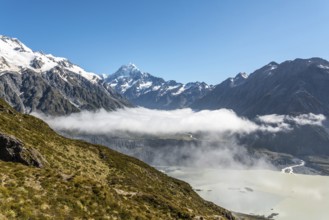 Cloudy view to the valley of Mount Cook National Park from Mueller Hut Route, South Island of New