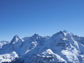 View from the peak of Schilthorn in the skiing resort of Muerren, Switzerland, on a beautiful