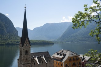 18.06.2019, Hallstatt, Upper Austria, Austria, Europe, View of the small village with church, Lake
