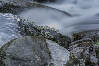 A frosty December day at the waterfall in the Perlbachtal valley near Bogen (Lower Bavaria)