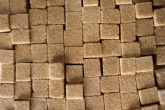 Background formed by a set of cubes of cane sugar