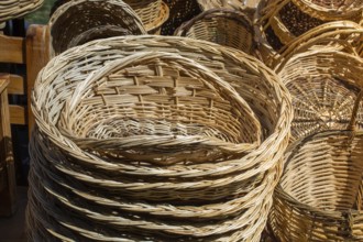 Empty wicker baskets are seein a market place