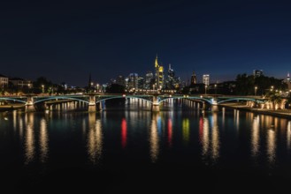 Frankfurt am Main, Hesse, Germany, 07 23 2018: cityscape at night taken from the river Main at the