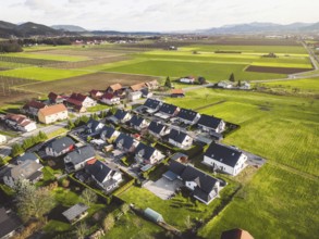 Drone view, aerial shoot of new build houses in the suburbs of Slovenia, somewhere in the country