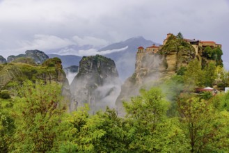 Monastery of Varlaam in the fog, the second largest Eastern Orthodox monastery in Meteora, Greece,